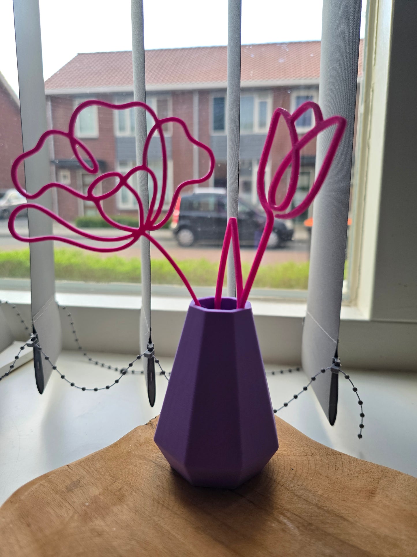 Mini vaasje met bloem